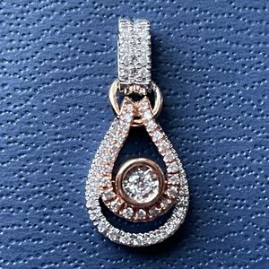 14 karat gold and diamond pendant